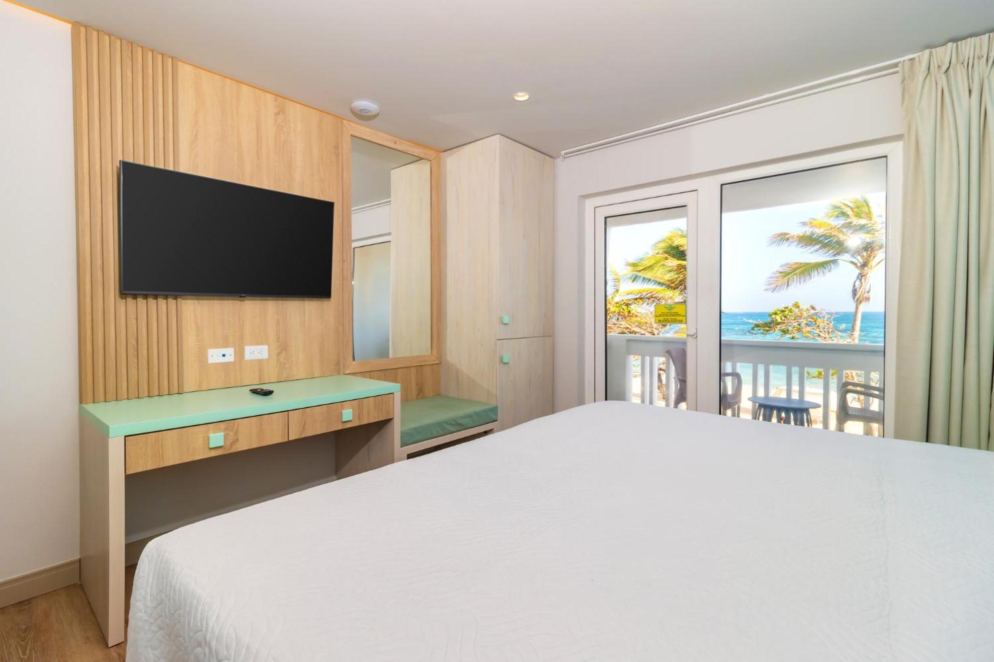Quarto Quádruplo com Vista do Mar.